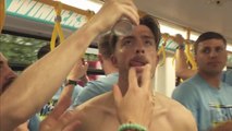 Grealish has beer poured in his mouth by Bernardo Silva as City treble celebrations begin