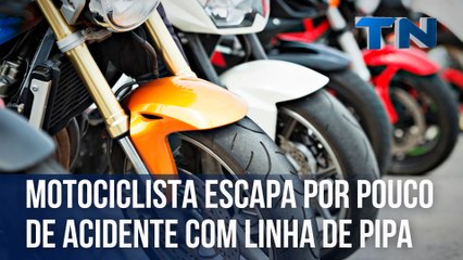 Motociclista escapa por pouco de acidente com linha de pipa