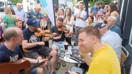 Marcas Ó Murchú, Dónal O'Connor and friends playing outside McReynold's at the Fleadh Cheoil Dhoire Dún Geimhin 2023