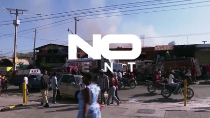 WATCH: Vendors despair as fire rages through Haiti market