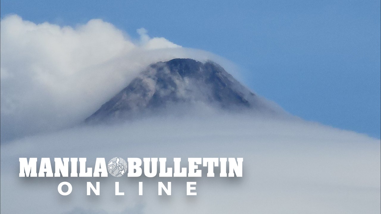 Clouds form a ring at Mayon's crater