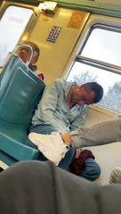 Sleeping Man on Train Falls Out of His Chair