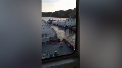 Moment fuel tankers collide, spilling gasoline into river in Russia