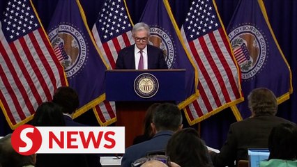US Fed pauses rate hikes, but warns inflation risks persist