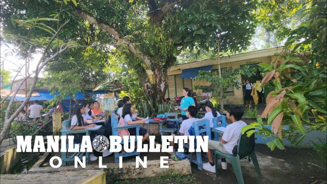 Students attend classes outside their classrooms in Albay