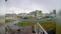 Doorbell camera captures the moment a man was struck - by bolt of lightning