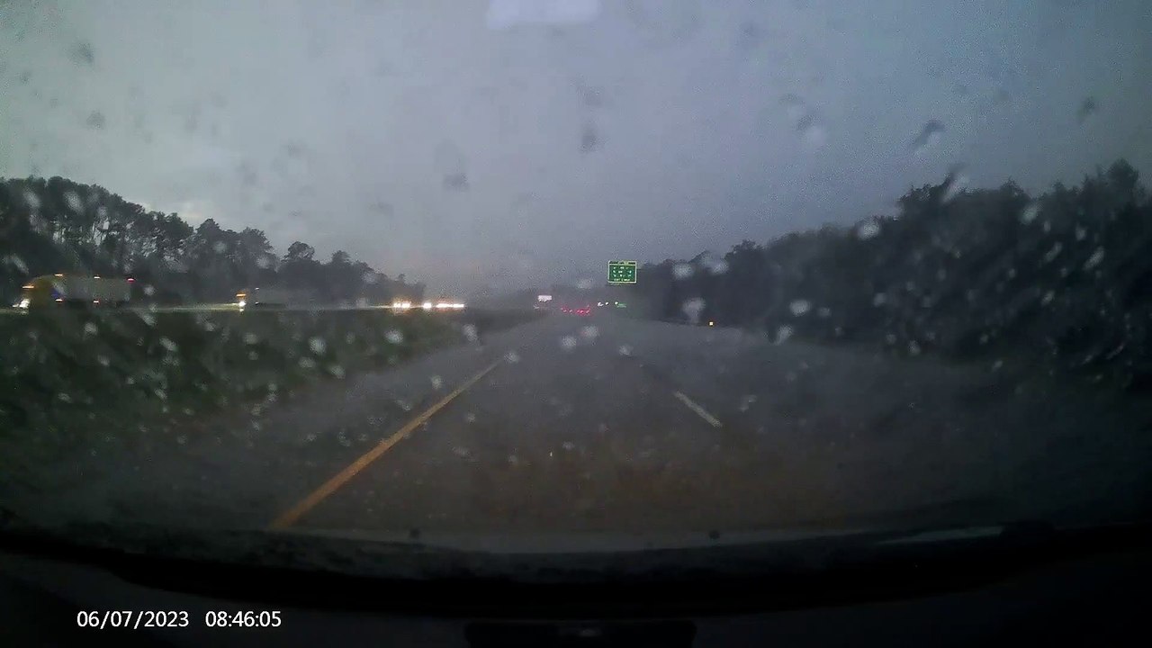 Dash Cam Captures Lightning Striking Vehicle on Highway