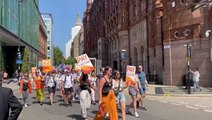 Striking junior doctors march through Manchester in row with government over pay