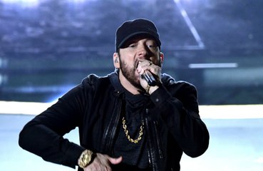 Eminem was a proud dad when he walked his daughter Alaina Scott down the aisle at her wedding