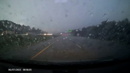 Dash Cam Captures Lightning Striking Vehicle on Highway