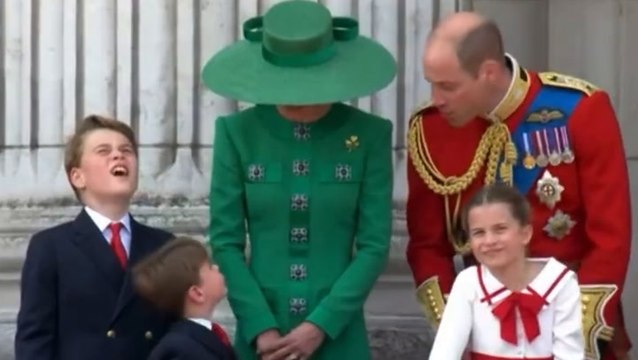 Prince Louis salutes crowds from Buckingham Palace balcony during Trooping the Colour flypast