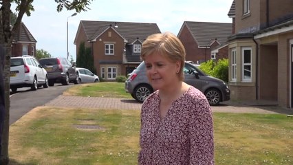 Nicola Sturgeon speaks to the media outside her home