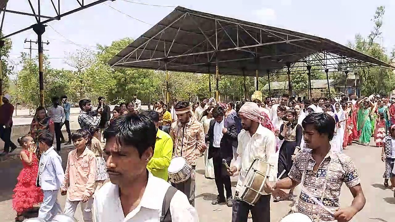 A procession of 35 couples came out together, 77 couples got married