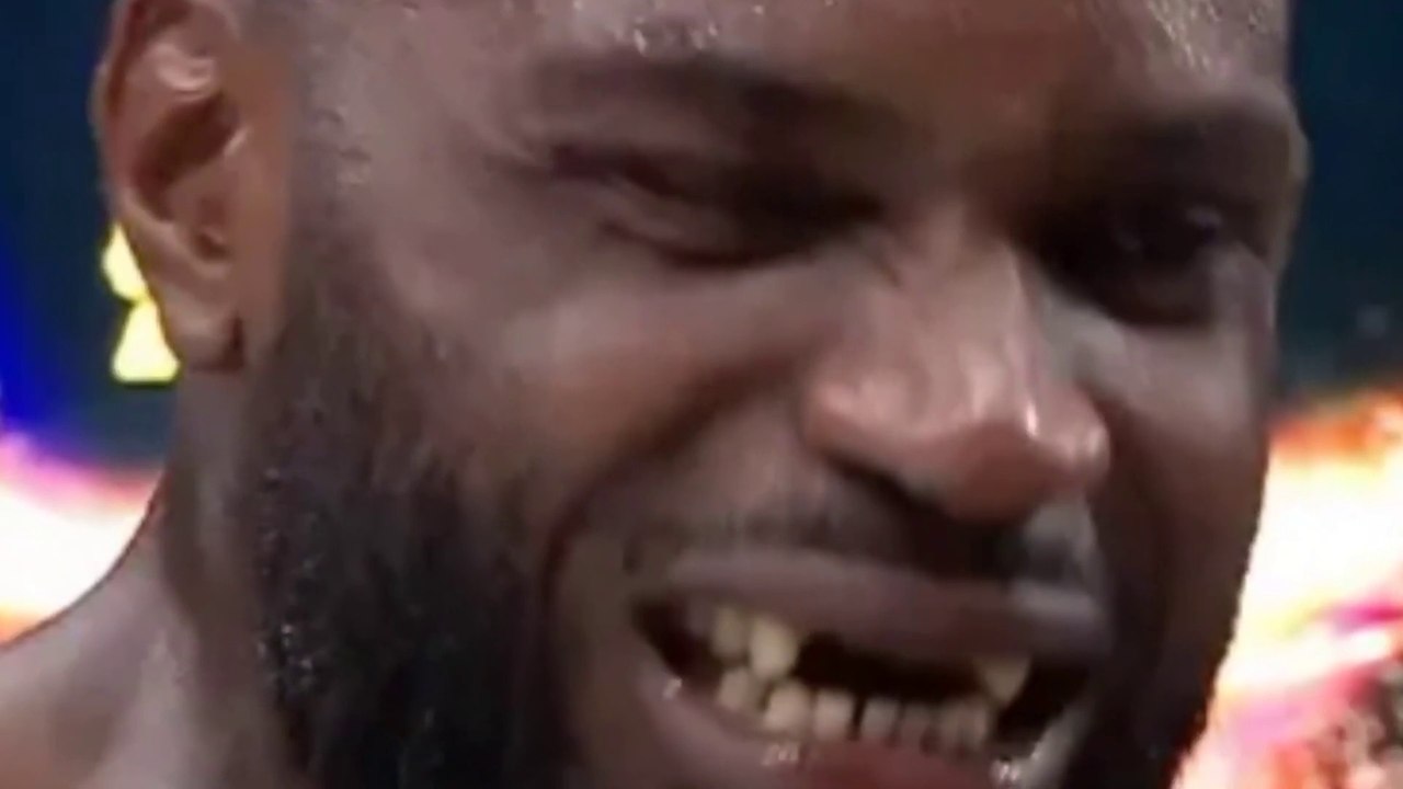 Kickboxer has his front TEETH knocked out during fight... before referee calls it off as he attempts to spit them out!