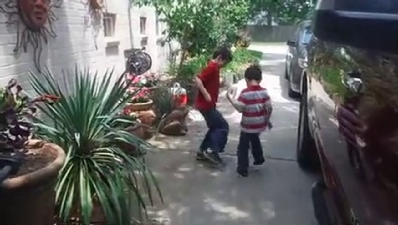 Christopher & Anthony stepping on ice cubes