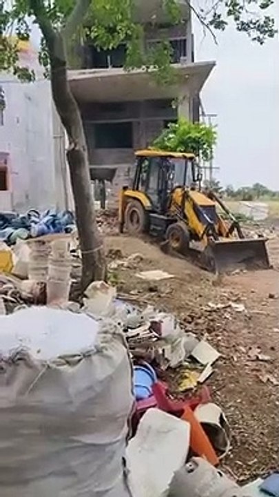 Administration's bulldozer on illegal colony and houses
