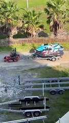 Guys Use Lawn Mower to Launch Jet Skis
