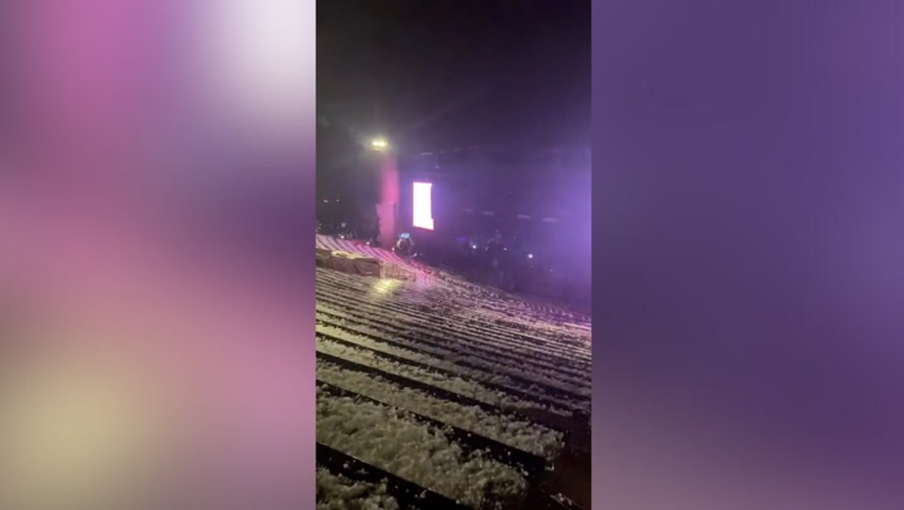 Watch: Massive hail stones pelt down as concertgoers dive for cover at ...