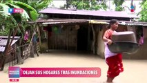 En India dejan sus hogares tras inundaciones