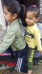 Trishu & Akshu on bike -dm
