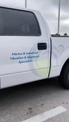 Car Drives Down Interstate With Hood Popped Open