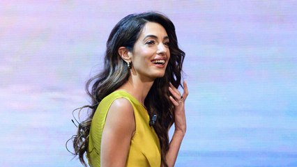Amal Clooney Ditched Her Trademark Soft Waves For Disco-Inspired Curls And We're Obsessed