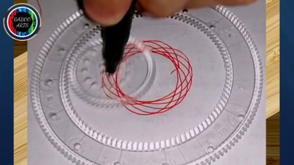 DIBUJANDO con un espirógrafo espirales rojos. DRAWING with a spirograph red spirals.