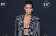 Kourtney Kardashian shows her baby bump in new bikini picture