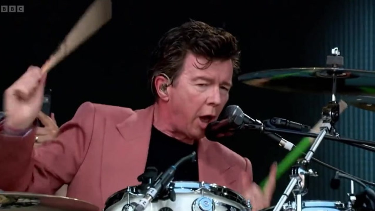 Rick Astley covers AC/DC’s ‘Highway to Hell’ on drums during impressive Glastonbury set