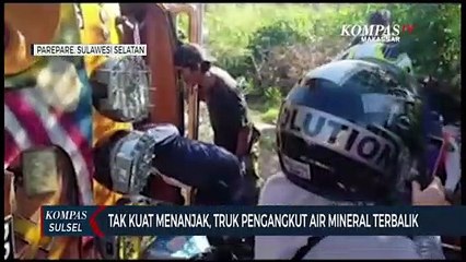 Tak Kuat Menanjak, Truk Pengangkut Air Mineral Terbalik