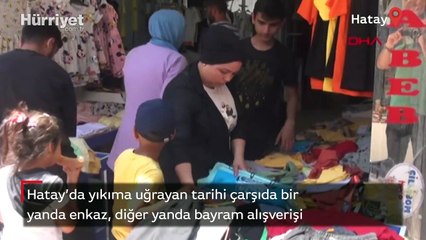 Hatay'da yıkıma uğrayan tarihi çarşıda bir yanda enkaz, diğer yanda bayram alışverişi