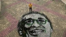 Bottle Art I Artist Recreates Gabo's Face with Recycled Glass Bottles at Colombia