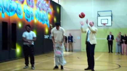 Prince William shoots some hoops with football star in Sheffield
