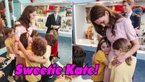 Kate sweetly hugs the children at the Young V&A museum tour