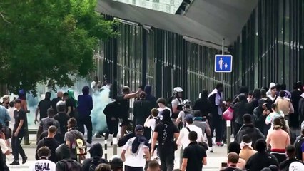 Watch: tear gas fired at people protesting over the police shooting of a teenager in France