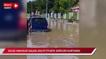 Amasya'da sel sularının ortasında mahsur kalan aileyi itfaiye ekipleri kurtardı