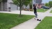 Woman takes hilarious tumble while trying to show off her hoverboarding skills to friends