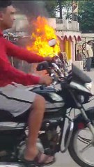 The crazy young man set his own bike on fire.. there was a commotion.