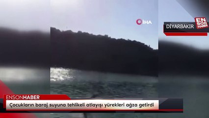 Çocukların baraj suyuna tehlikeli atlayışı yürekleri ağza getirdi