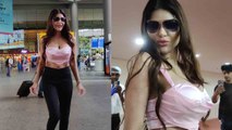 Sherlyn Chopra ने Bold Look में Airport पर किया Hot Dance, बेकाबू हुए फैंस | VIRAL VIDEO | FilmiBeat