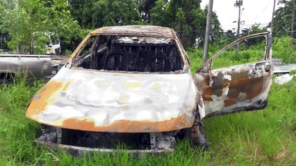 BODY BURNT IN CAR