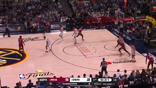 Bam Adebayo passes to the Miami Heat bench off a set play by the Miami Heat in Game 5 of the 2023 NBA FINALS
