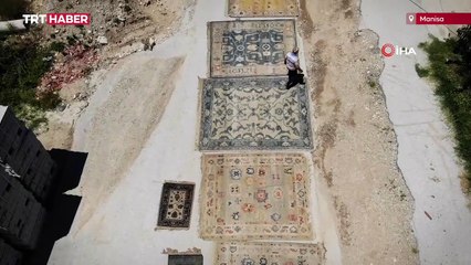 Yollara serilen halılar görenleri şaşkına çeviriyor