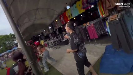 Out-of-control skydiver crash-lands on market roof in Thailand