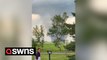 Huge tornado interrupts golf game near Carstairs, Canada