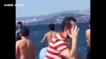 Büyükada'da kendine çöp poşetinden can simidi yapan yabancı uyruklu kişi denize böyle girdi