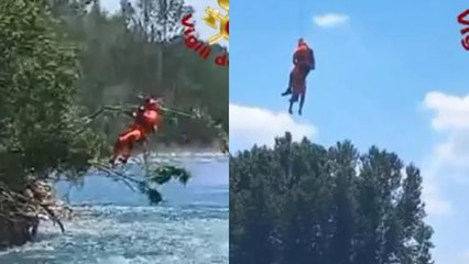 Nehre düşen kadın, itfaiye helikopteriyle kurtarıldı