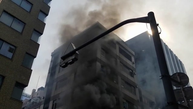 Fire breaks out after explosion rips through building in downtown Tokyo, injuring four