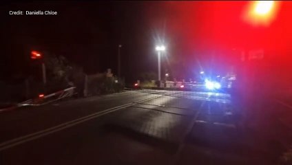 A level crossing barrier was destroyed in a crash