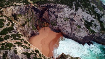 Portugal Hidden Sandy Beach on the Coast of Portuga